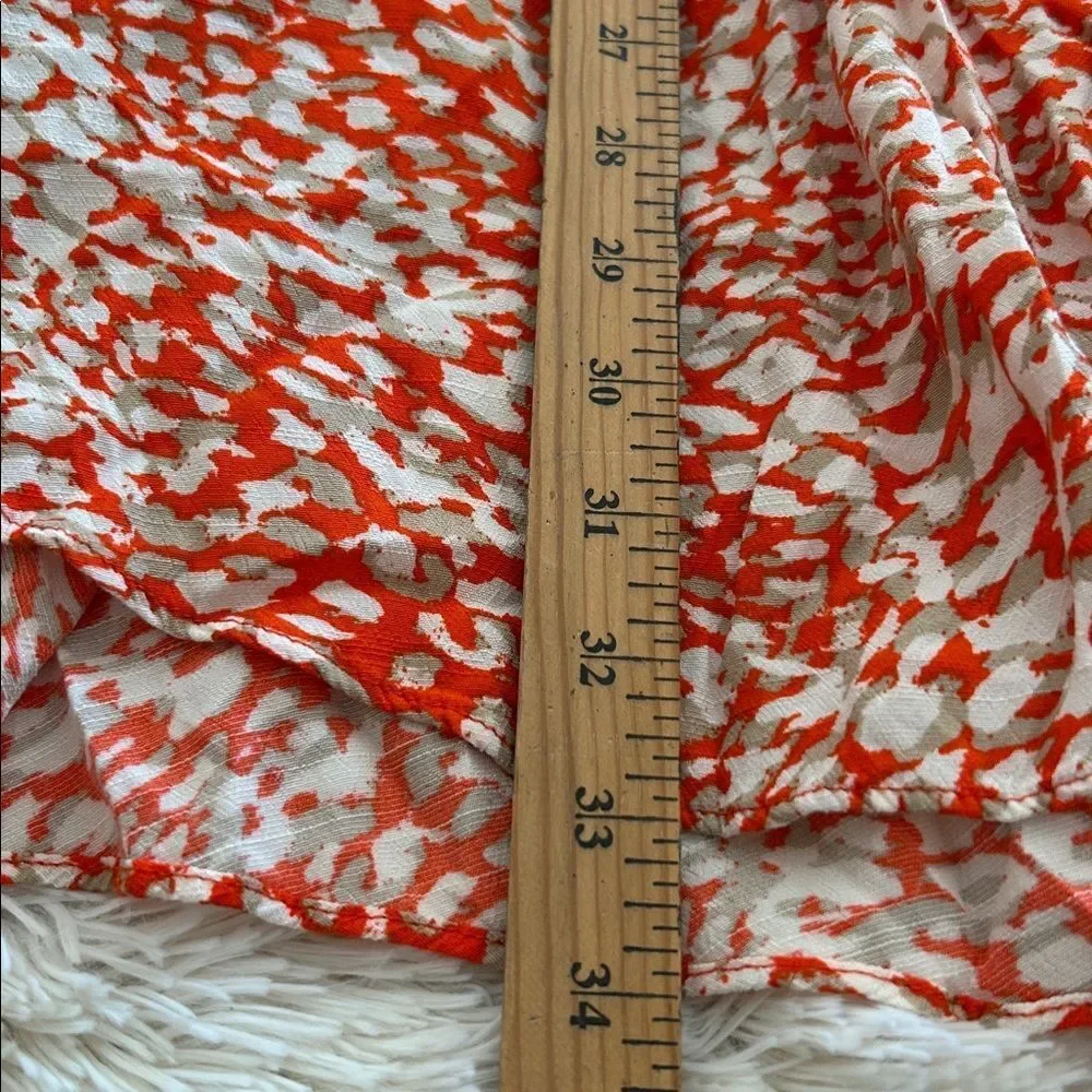 Free People French Quarter Wrap Mini Dress orange and white animal small